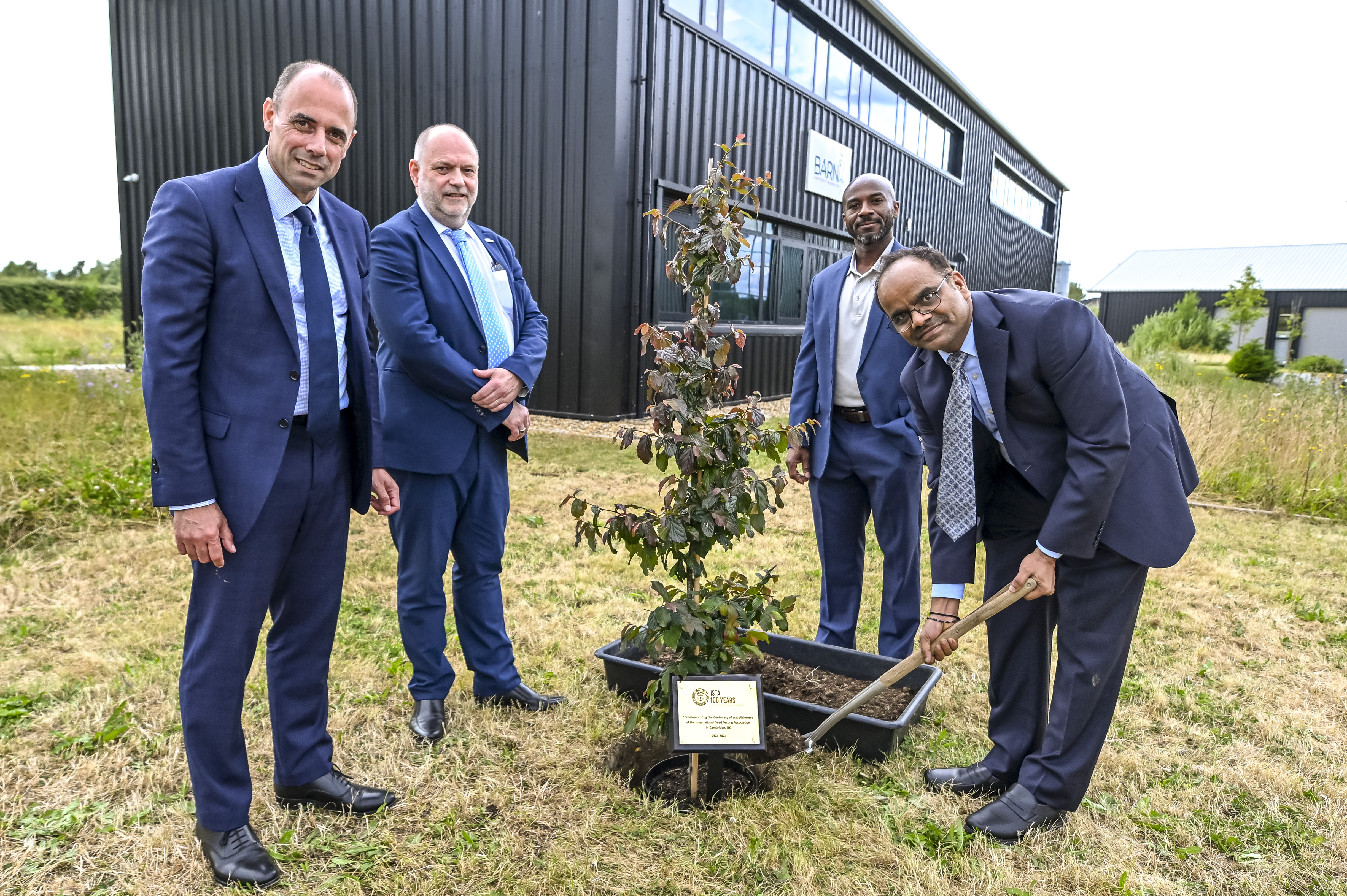 ISTA delegates planting a tree to celebrate 100 years of ISTA