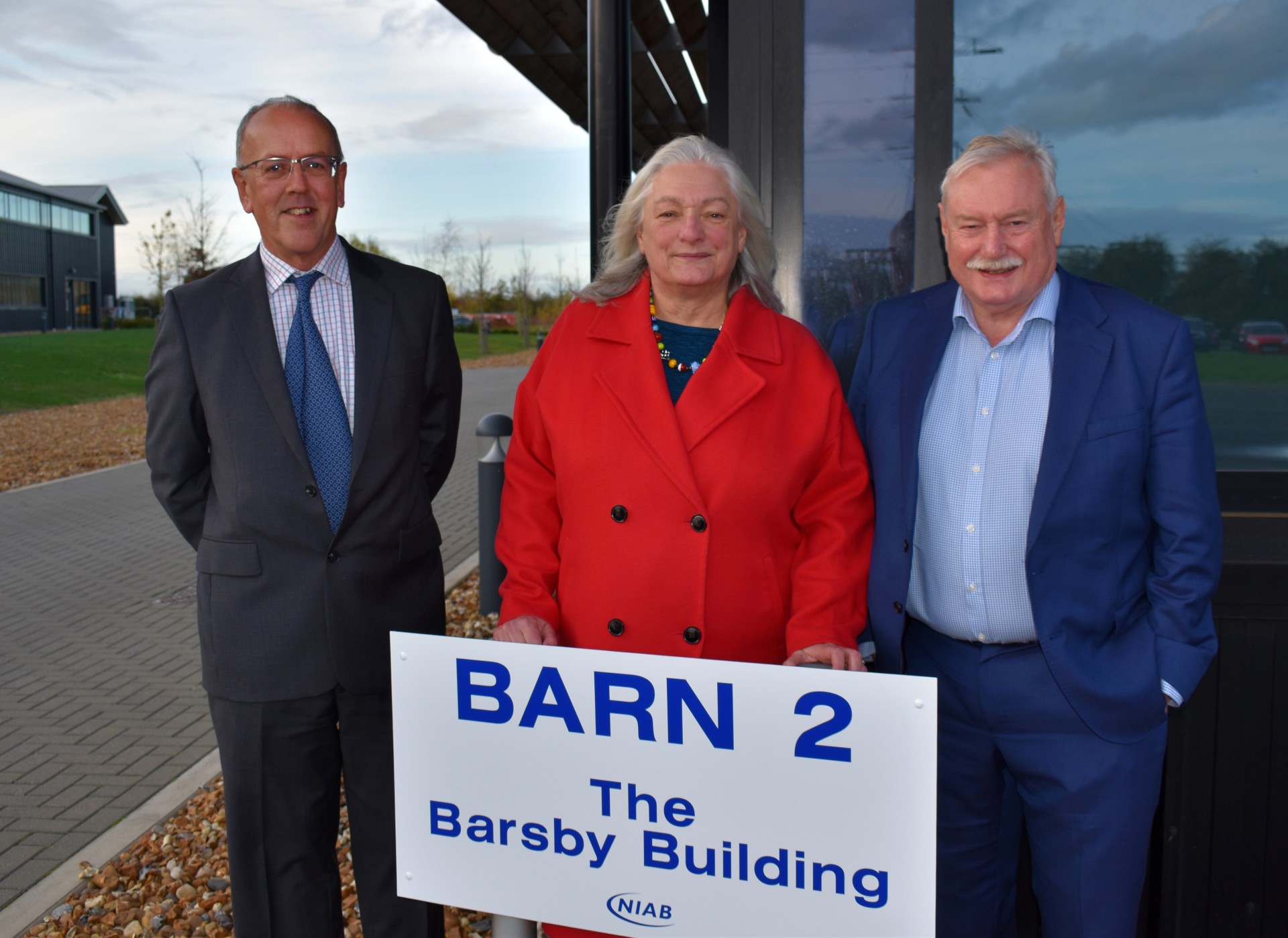 NIAB Project Manager David Neill, Tina Barsby and Wayne Powell outside the newly renamed Barsby building